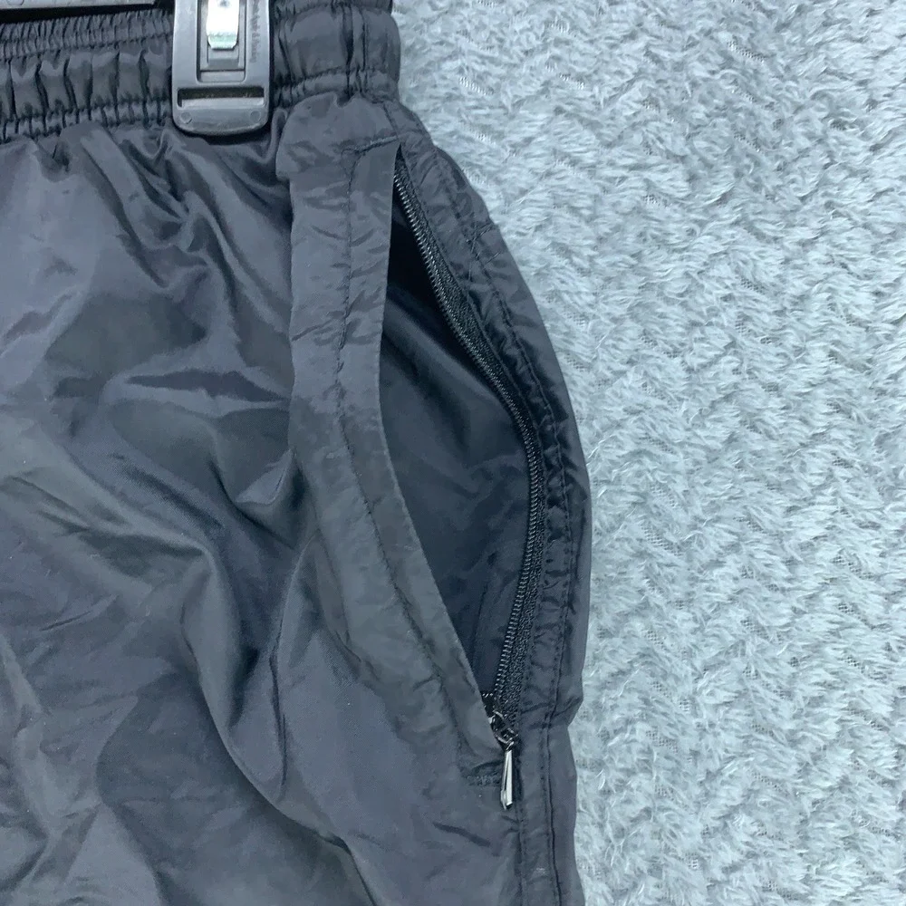 Nike Kids L 12-14 Black Nylon Windbreaker Track Pants Lined Zipper Cuffs Joggers